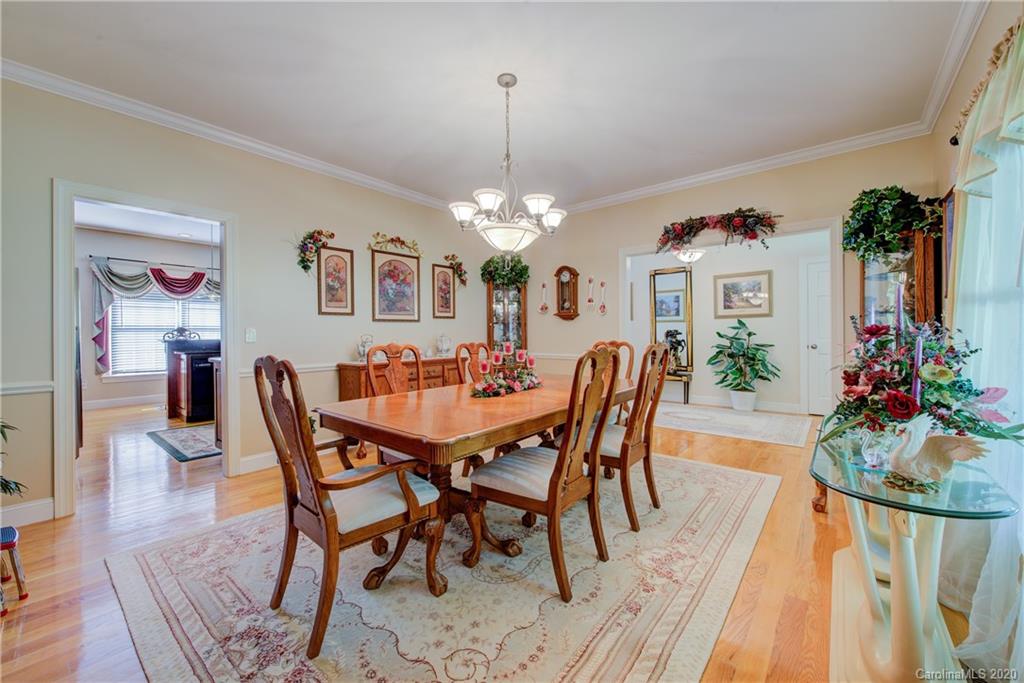 146 Pumkin Patch Road Rutherfordton, NC 28139 - Photo 20 of 48 a view of a dining room with furniture and wooden floor