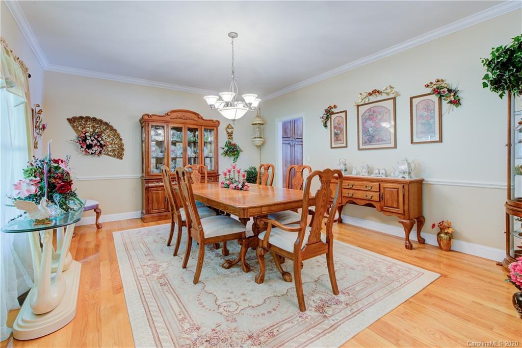 146 Pumkin Patch Road Rutherfordton, NC 28139 - Photo 21 of 48 a view of a dining room with furniture and wooden floor