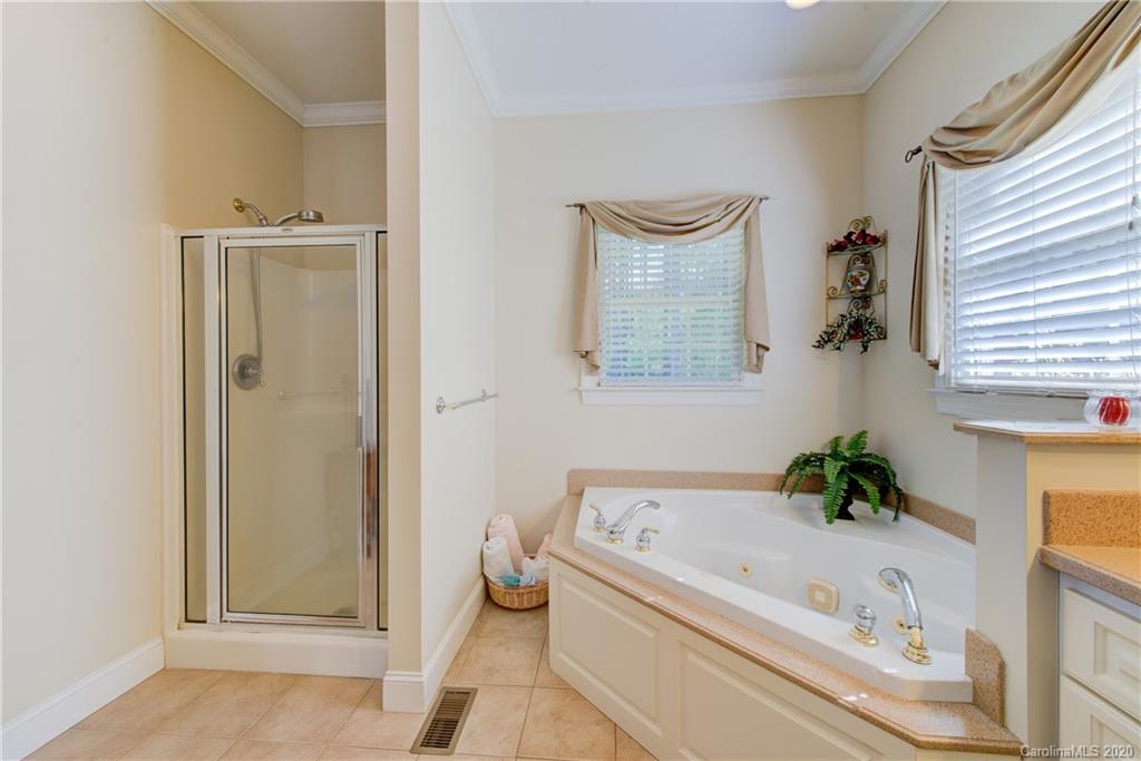 146 Pumkin Patch Road Rutherfordton, NC 28139 - Photo 27 of 48 a bathroom with a tub and shower