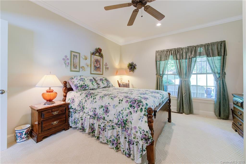 146 Pumkin Patch Road Rutherfordton, NC 28139 - Photo 30 of 48 a bedroom with a bed dresser and a window