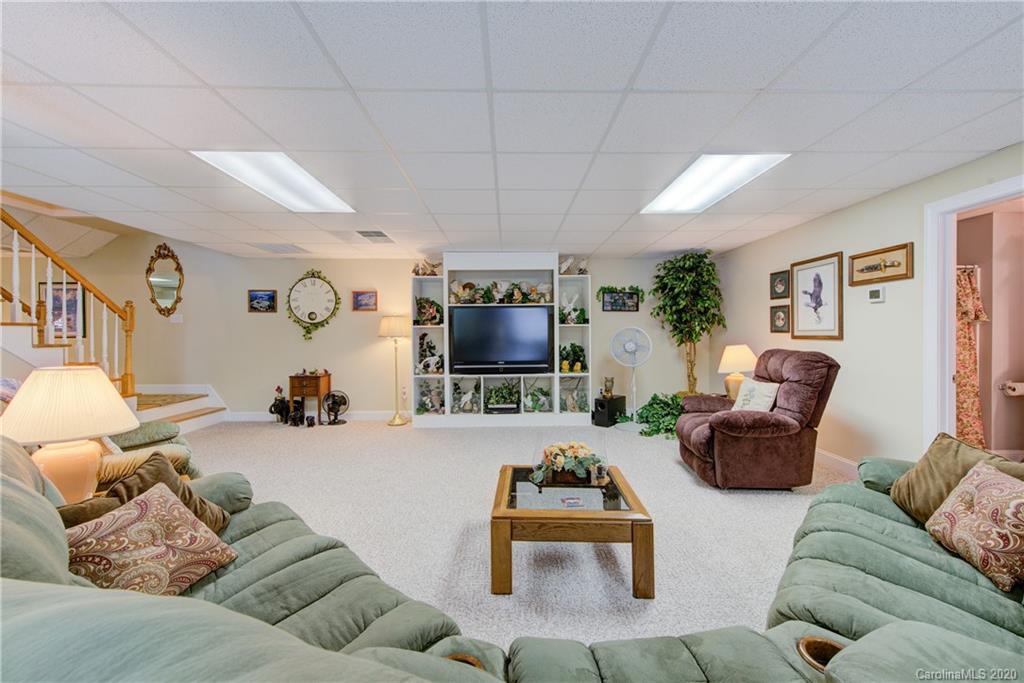 146 Pumkin Patch Road Rutherfordton, NC 28139 - Photo 40 of 48 a living room with furniture and a flat screen tv