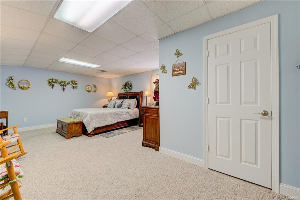 146 Pumkin Patch Road Rutherfordton, NC 28139 - Photo 42 of 48 a bedroom with bed and a window