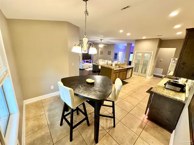 a living room with furniture fireplace and flat screen tv