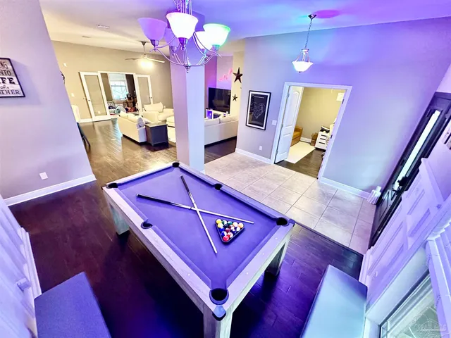 a kitchen with lots of counter top space and appliances