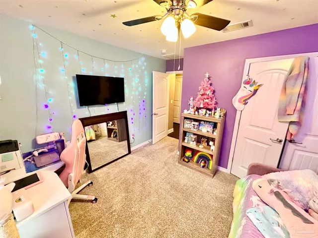 a room with furniture toys and wooden floor