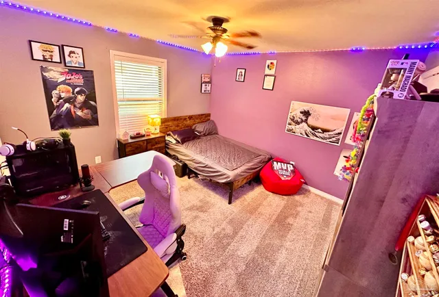 a room with table chairs and wooden floor