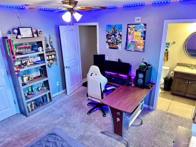 a living room with a couch and dresser