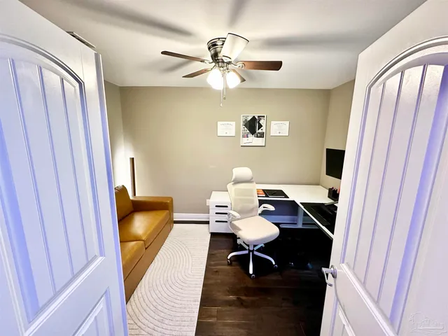 a bedroom with a bed and cabinets
