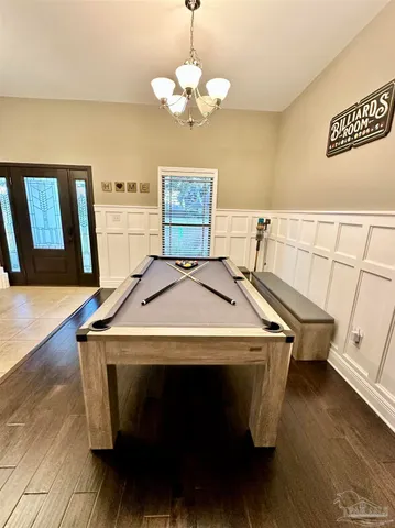 a view of a swimming pool with a patio