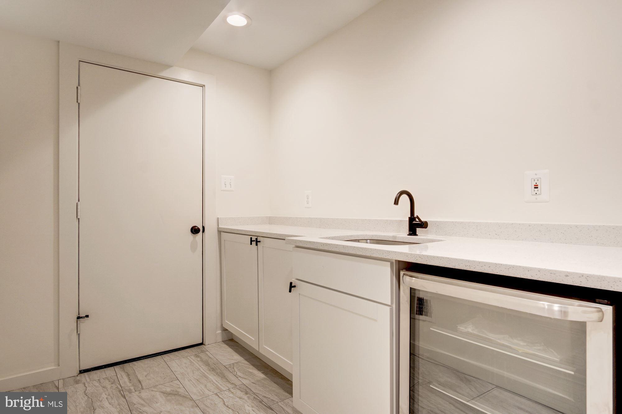 721 Roxboro Place Northwest Washington, DC 20011 - Photo 33 of 41 Basement Wet Bar with Beverage Fridge