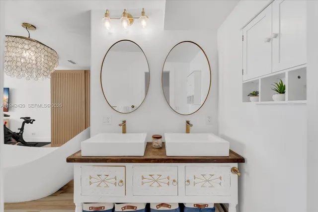 a view of a chairs and table in the patio