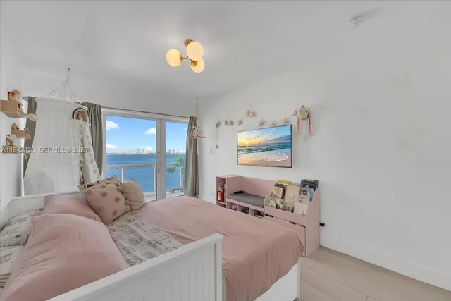 a view of a garden with palm trees