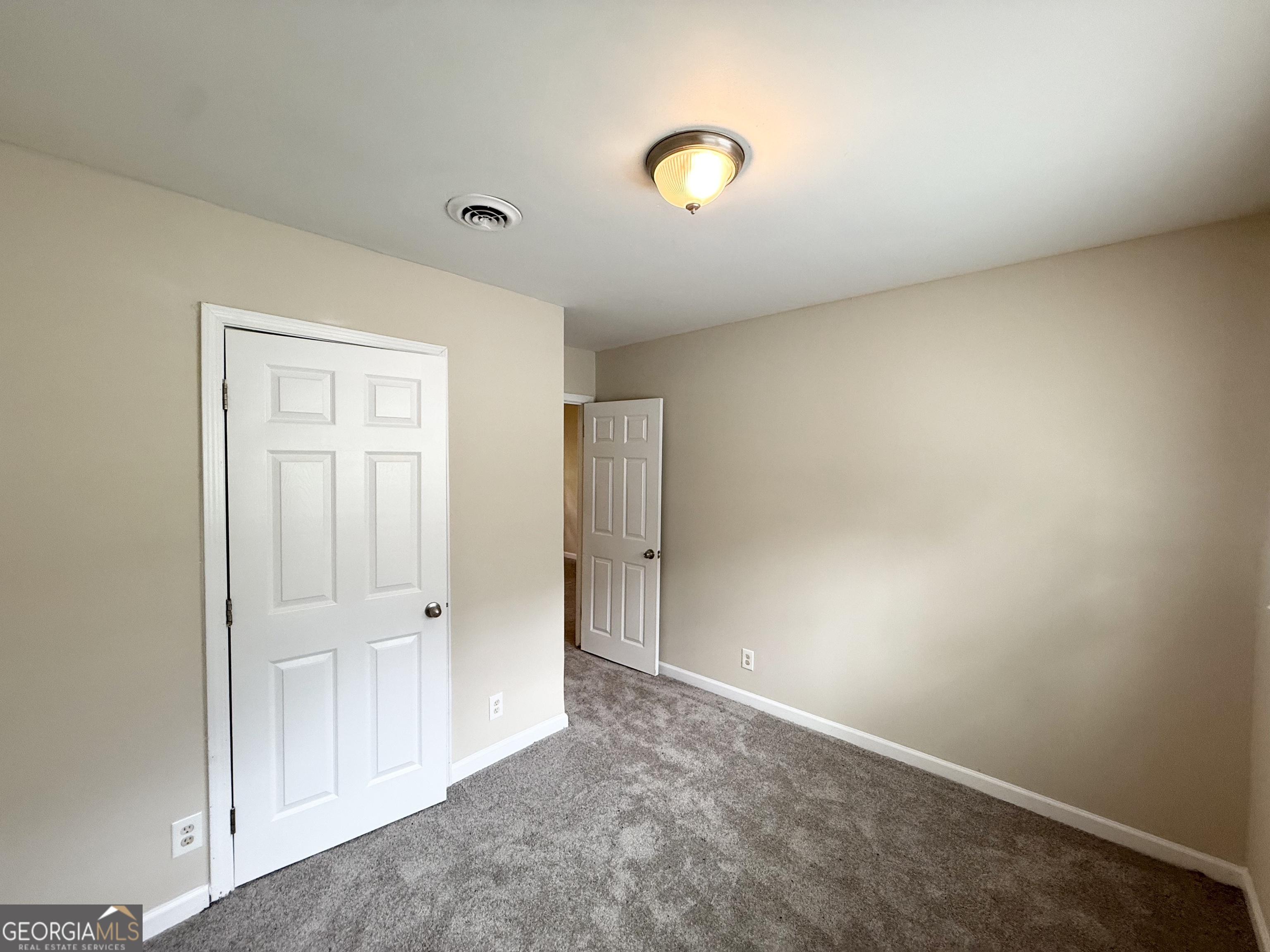2782 Ocean Valley Road Atlanta, GA 30349 - Photo 20 of 27 an empty room with closet area