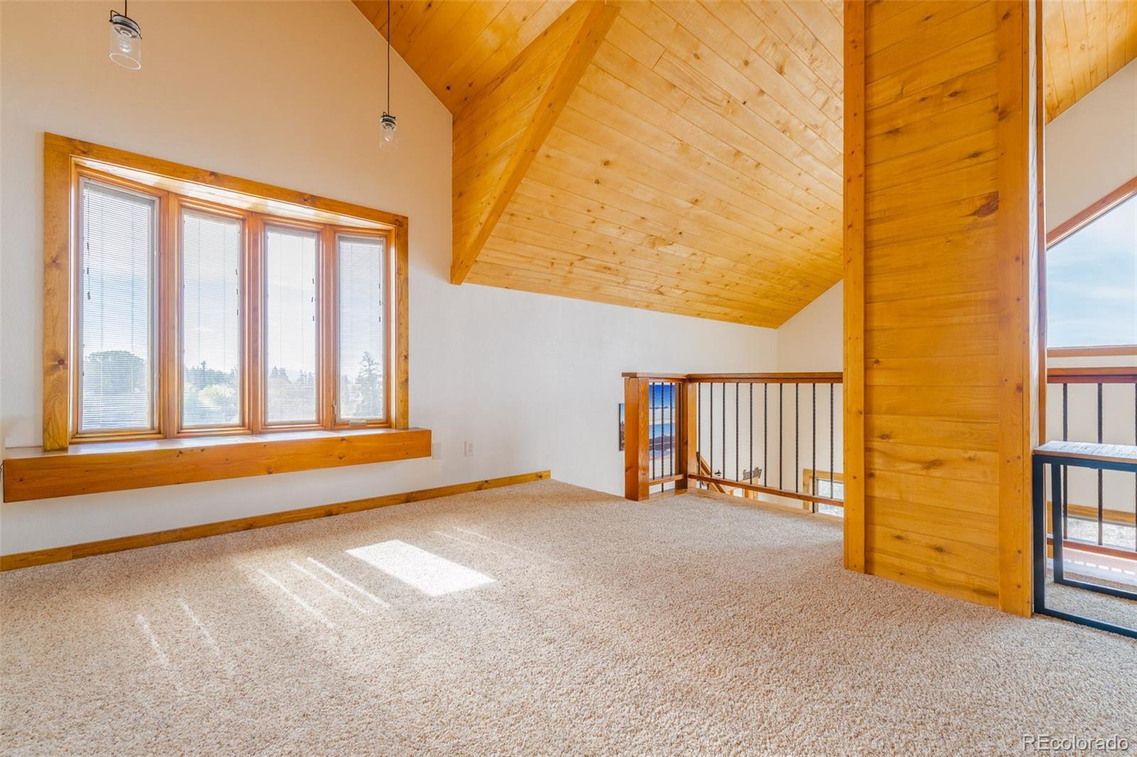 8221 Remington Road Como, CO 80432 - Photo 25 of 49 a view of an empty room with a window