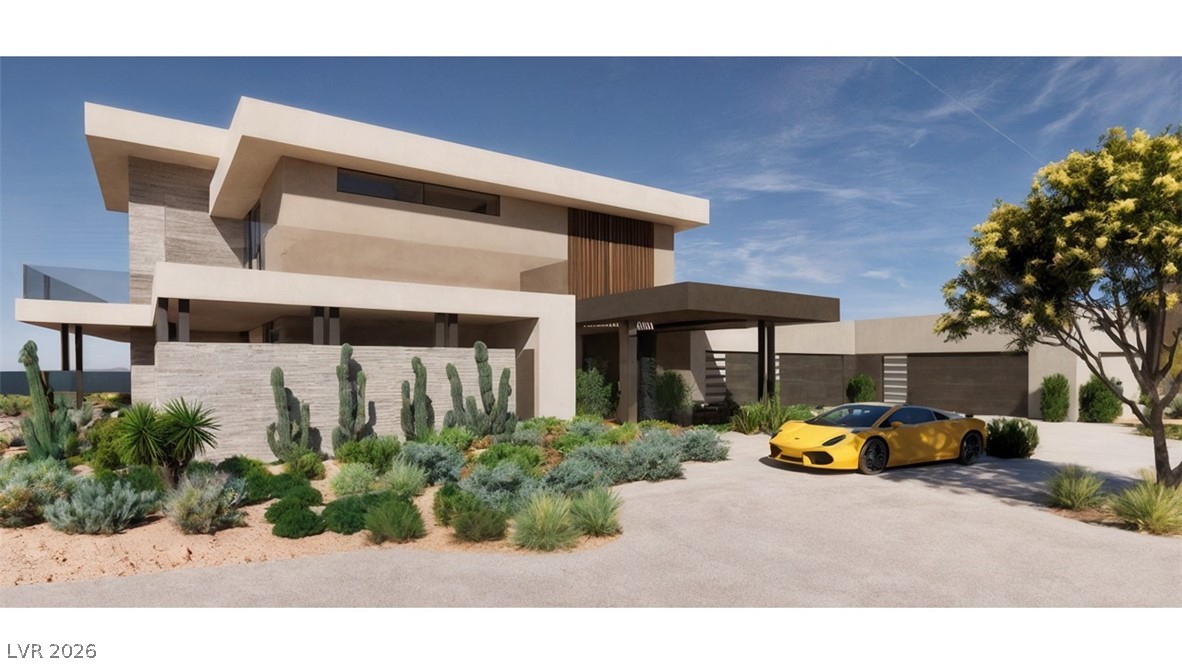 7 Chisel Crest Court Henderson, NV 89012 - Photo 1 of 8 Bold geometric lines and desert landscaping define the striking facade of this contemporary estate.