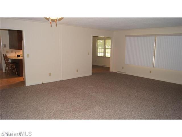 4869 East Nc 704 Sandy Ridge Sandy Ridge, NC 27046 - Photo 7 of 16 Living Room.