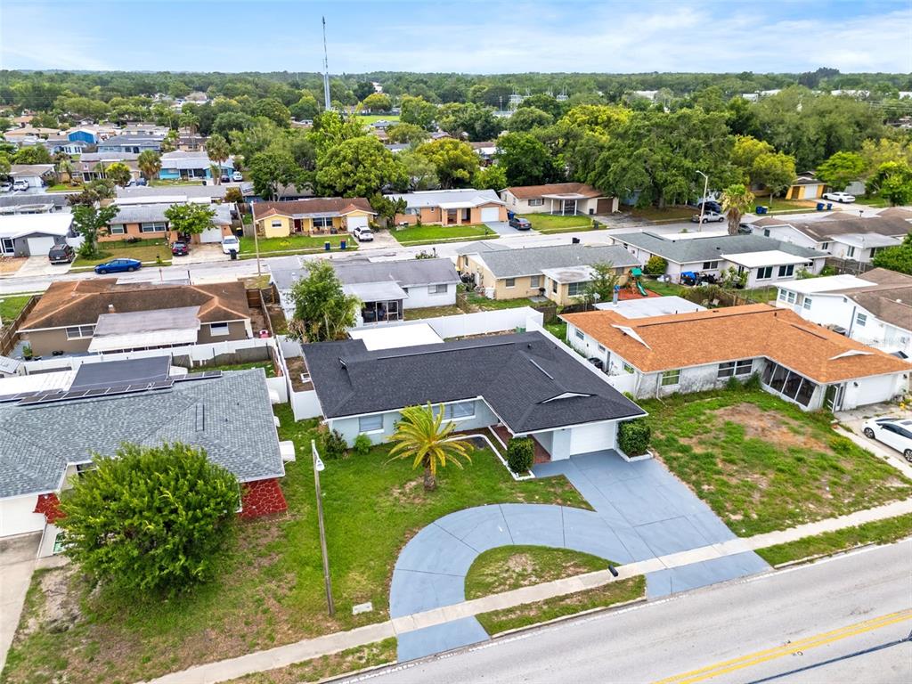 5626 Moog Road Holiday, FL 34690 - Photo 35 of 38 a view of a city with lawn chairs