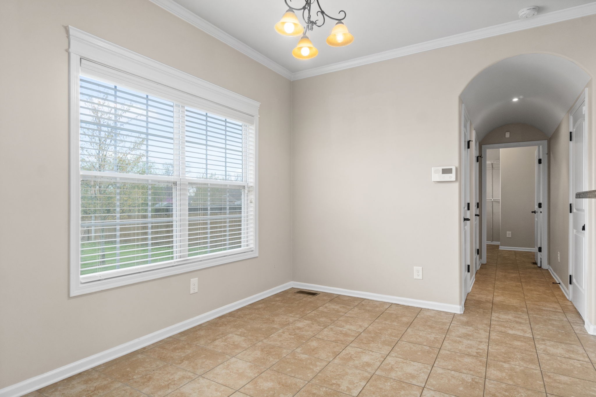 1431 Raven Road Clarksville, TN 37042 - Photo 13 of 32 a view of an empty room with a window