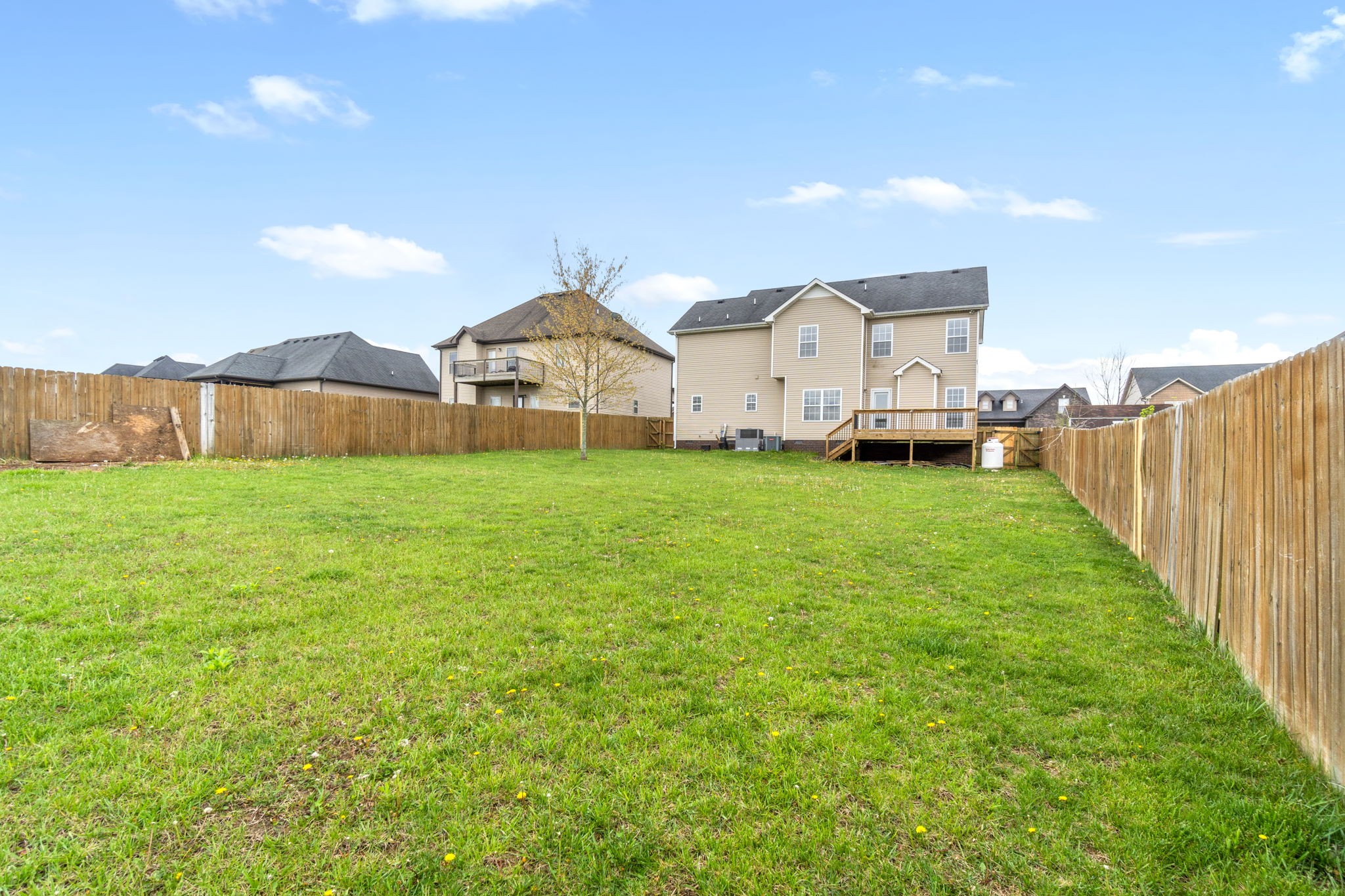 1431 Raven Road Clarksville, TN 37042 - Photo 28 of 32 a view of a big house with a big yard and large trees