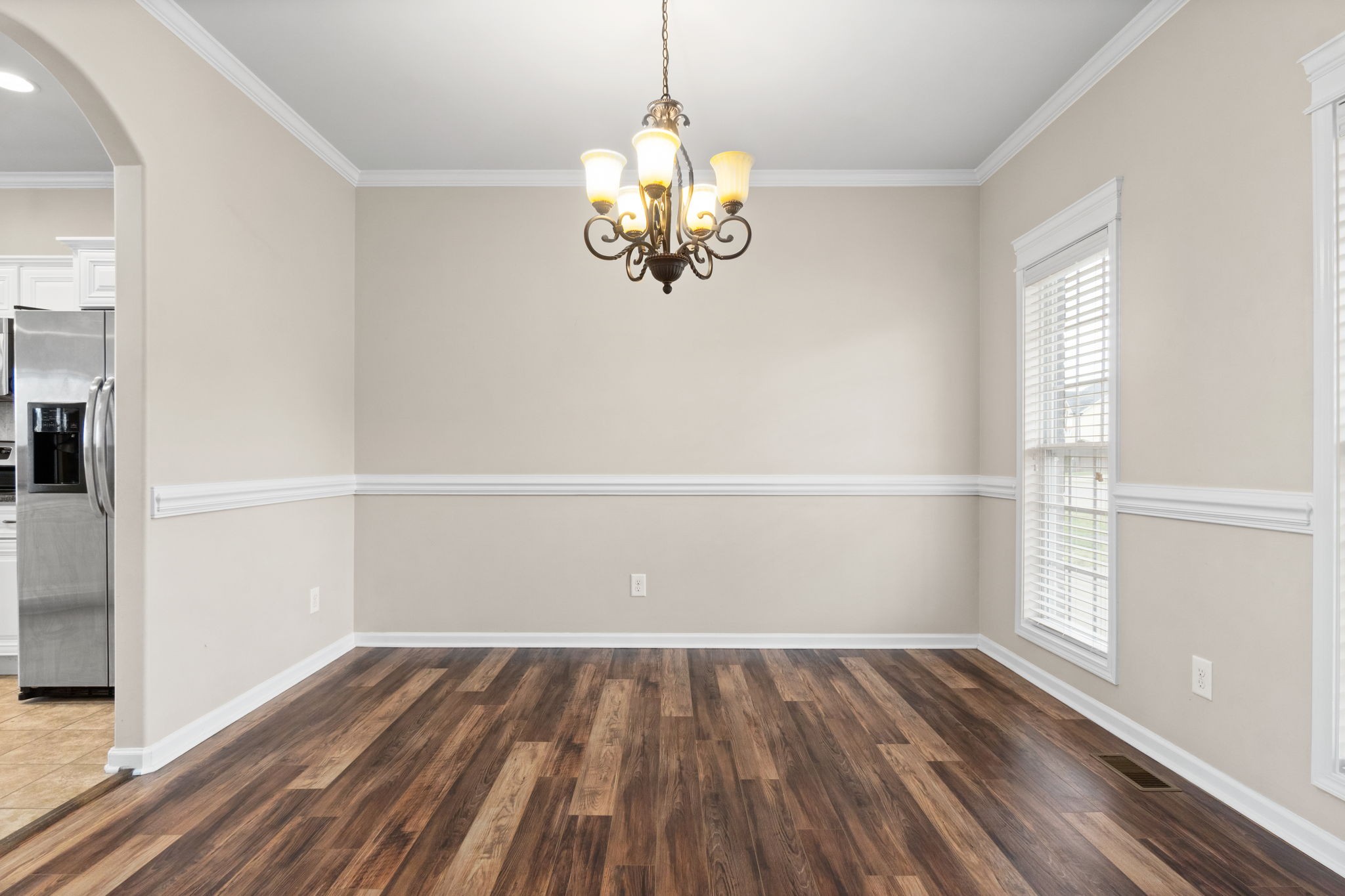 1431 Raven Road Clarksville, TN 37042 - Photo 4 of 32 a view of a room with wooden floor and window