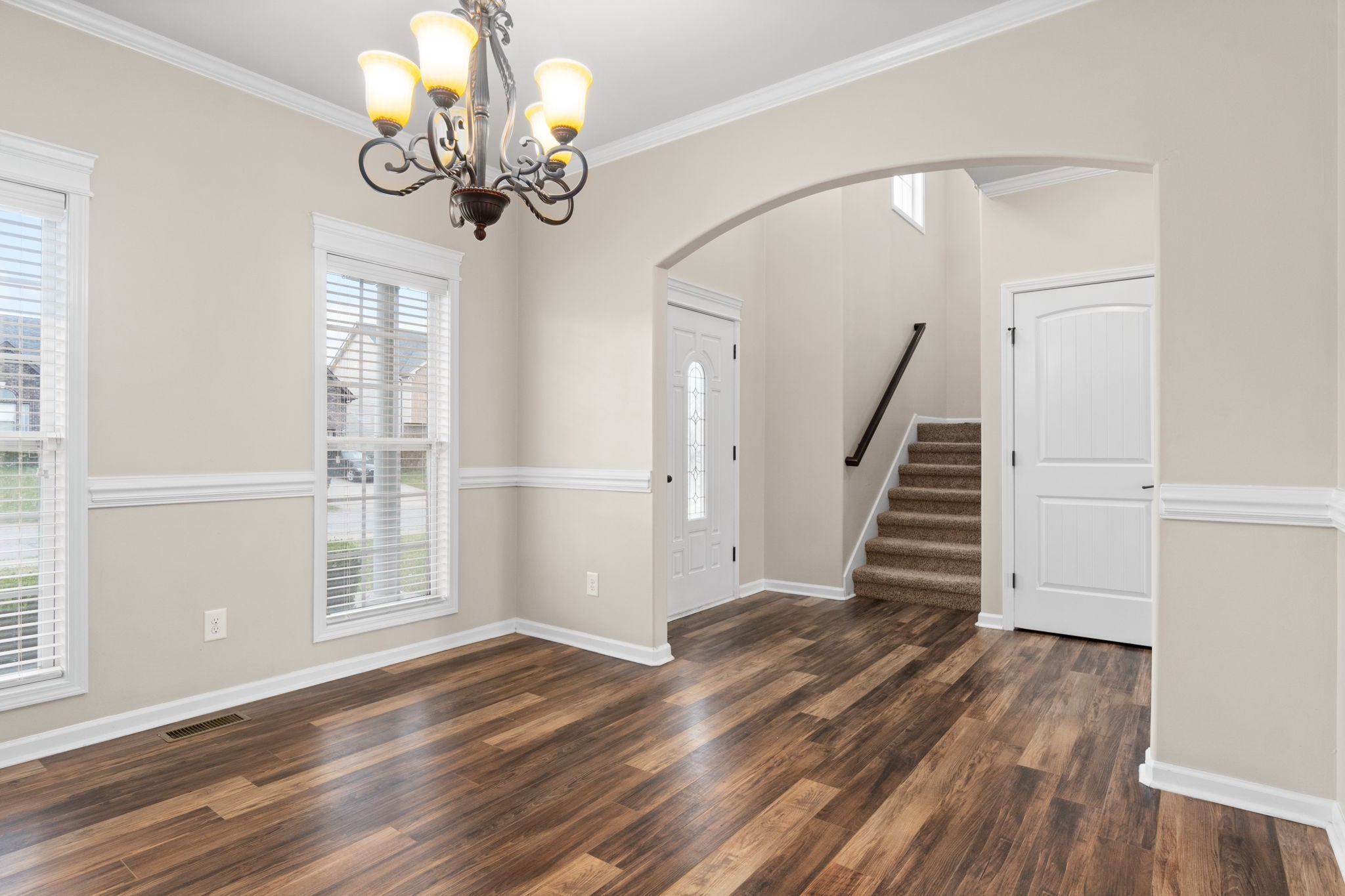 1431 Raven Road Clarksville, TN 37042 - Photo 5 of 32 a view of an entryway with wooden floor and a window