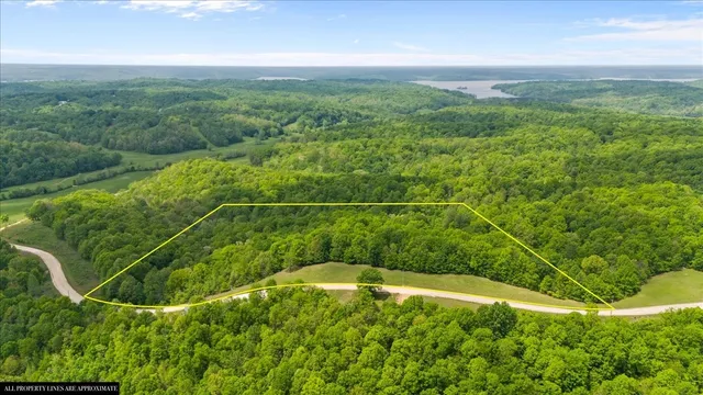 a view of a yard with an outdoor seating and deck