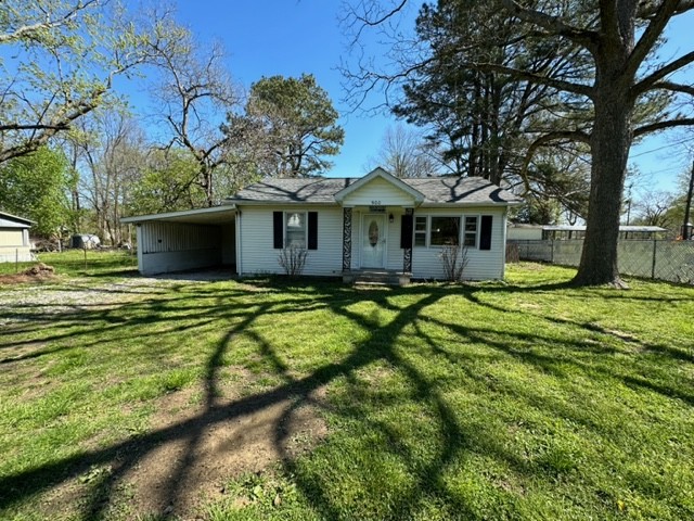 900 Summitville Road Manchester, TN 37355 - Photo 3 of 5 a view of a house with a big yard plants and large trees