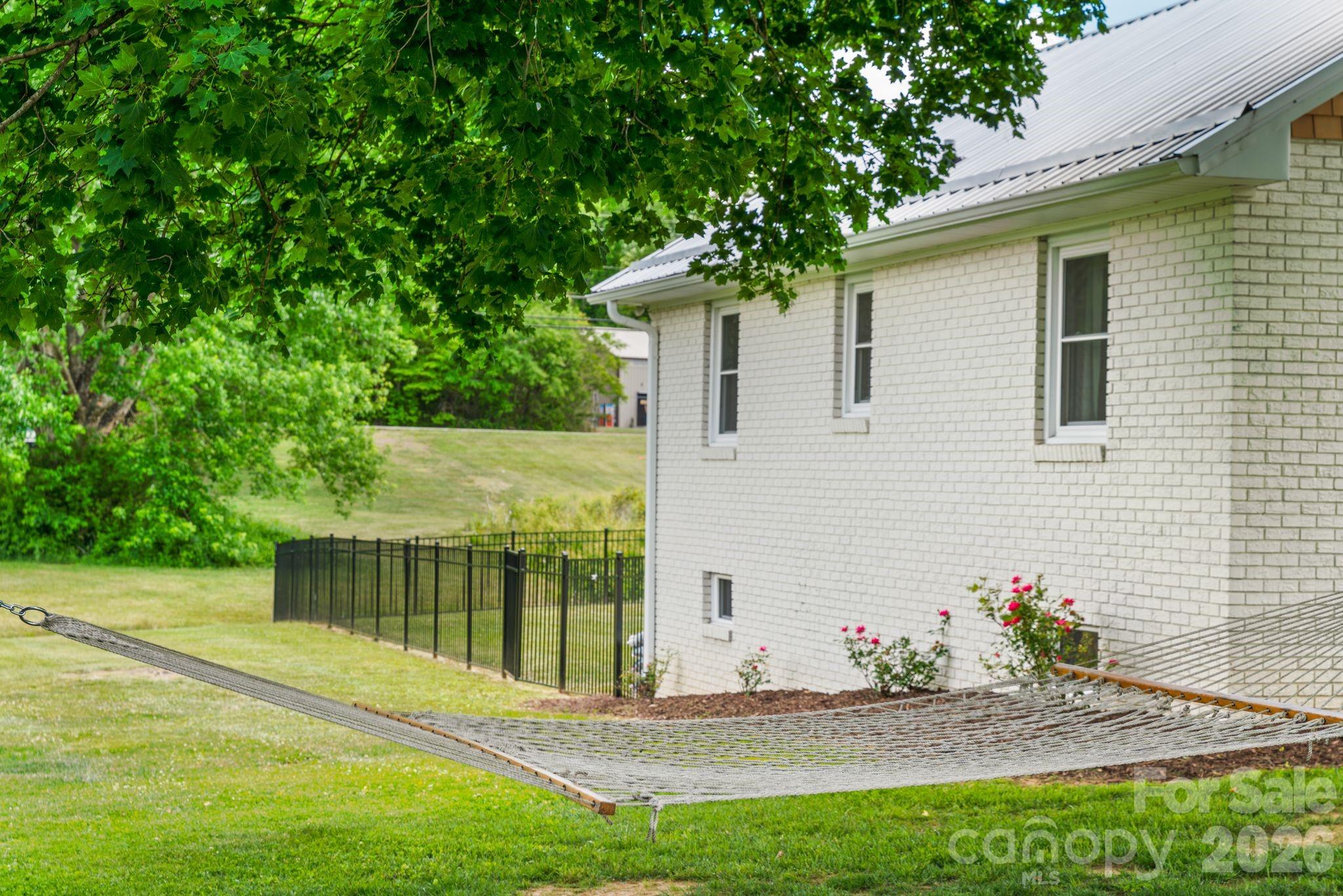97 Paul Holland Road Canton, NC 28716 - Photo 31 of 35 a view of a house with a yard