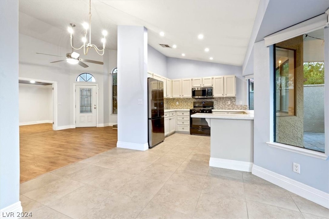 375 Rushing Creek Court Henderson, NV 89014 - Photo 2 of 37 Bright Open Kitchen with Stainless Steel Appliances