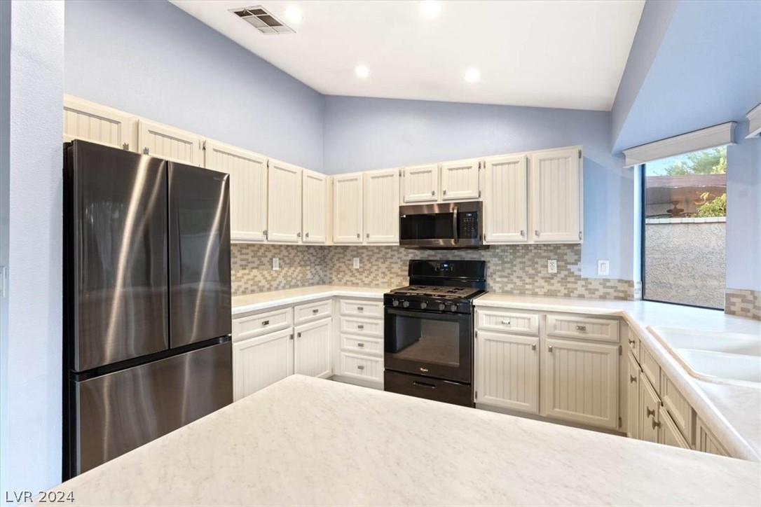 375 Rushing Creek Court Henderson, NV 89014 - Photo 3 of 37 Lots of Counter Space & Upgraded Cabinets