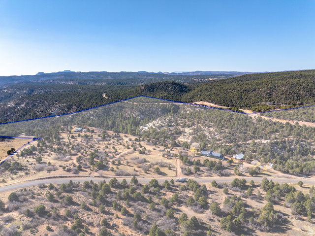 6 South N Frk Road Orderville, UT 84758 - Photo 43 of 68 Aerial view of property and surrounding area featuring property parcel outlined and a mountain backdrop