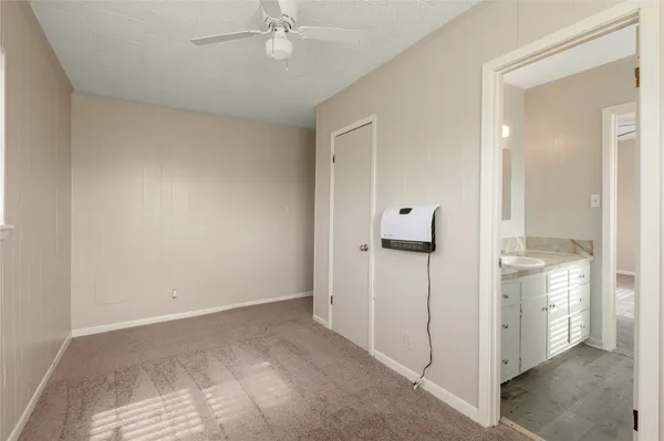 a view of a room with a wardrobe space