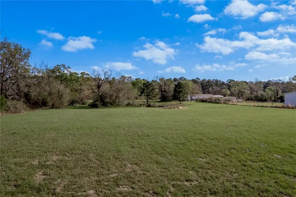 a view of a lake in middle of the town