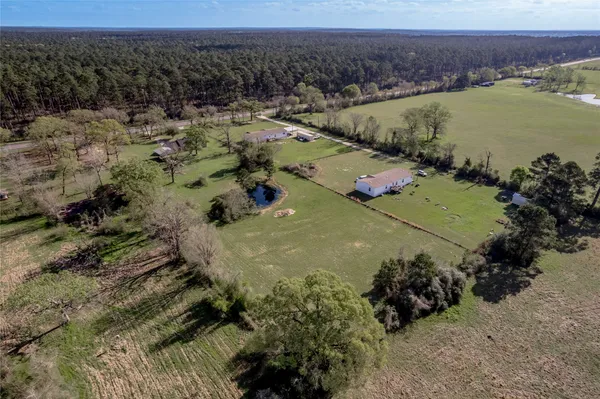 a view of a houses with a yard