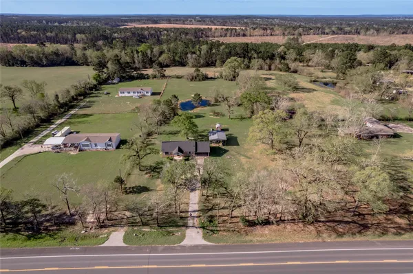 an aerial view of lake residential house with outdoor space