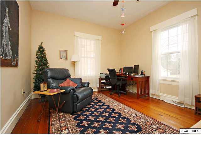 254 Dry Bridge Road Charlottesville, VA 22903 - Photo 16 of 26 a living room with furniture rug and window