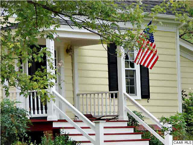254 Dry Bridge Road Charlottesville, VA 22903 - Photo 2 of 26 a view of entryway with flower garden and wooden fence