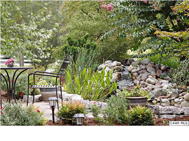 254 Dry Bridge Road Charlottesville, VA 22903 - Photo 3 of 26 a view of swimming pool with a bench