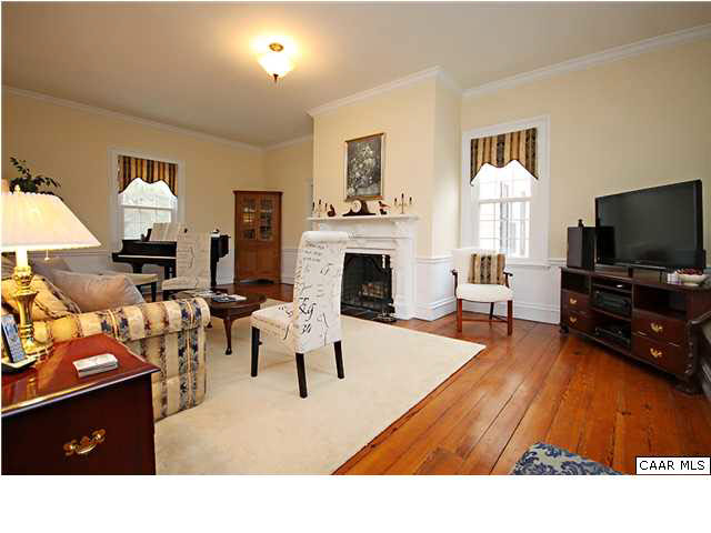 254 Dry Bridge Road Charlottesville, VA 22903 - Photo 7 of 26 a living room with furniture and a flat screen tv