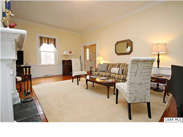 254 Dry Bridge Road Charlottesville, VA 22903 - Photo 9 of 26 a living room with furniture and a flat screen tv
