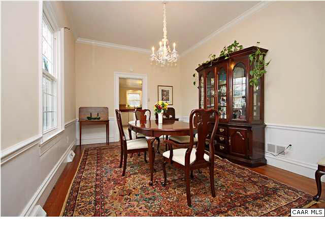 254 Dry Bridge Road Charlottesville, VA 22903 - Photo 10 of 26 a view of a dining room with furniture and chandelier