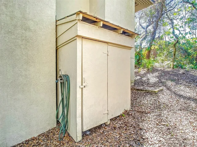 a bathroom with a shower and a sink