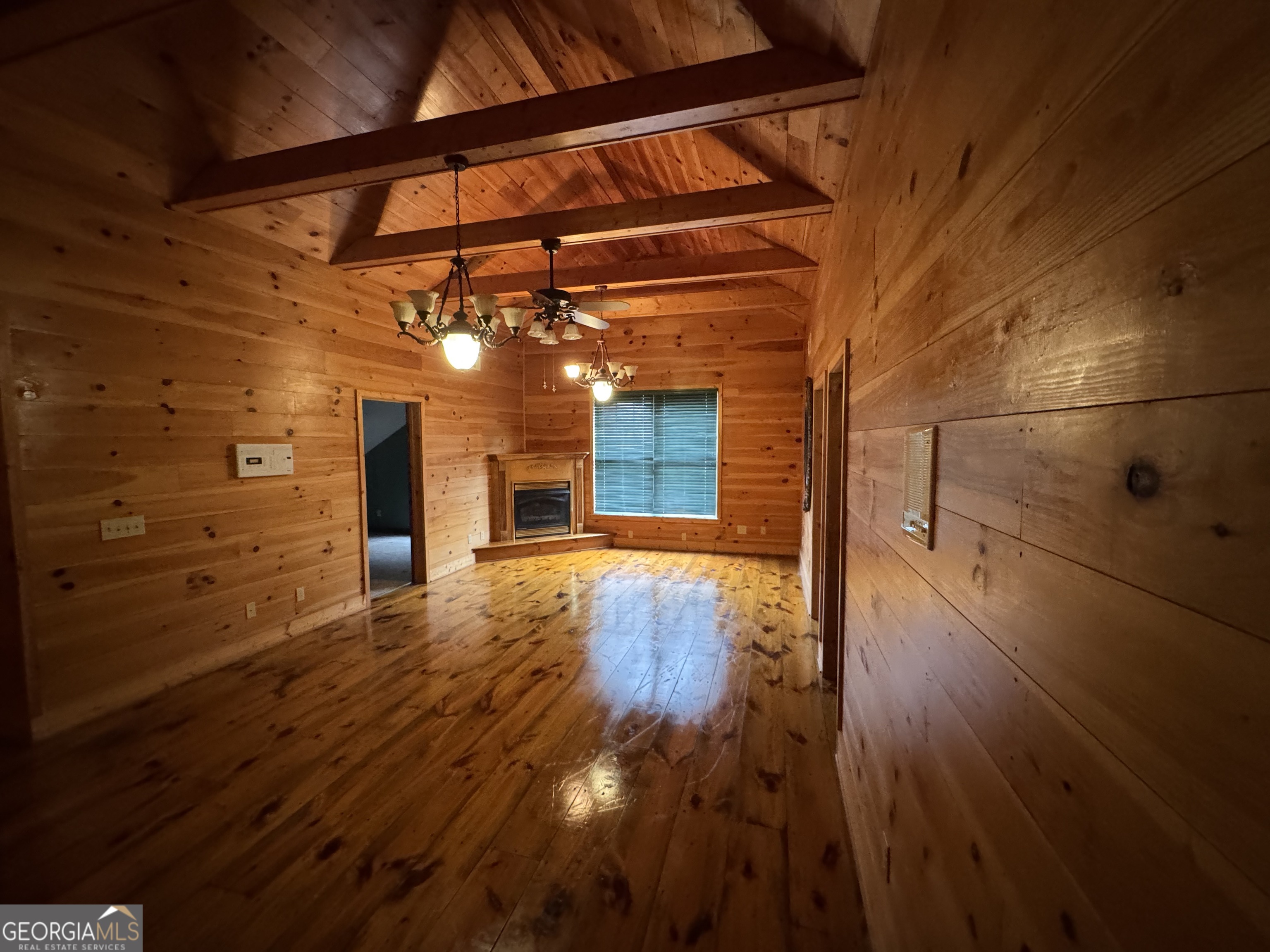 1045 Pleasant Hill Road Jasper, GA 30143 - Photo 12 of 20 a view of a room with wooden floor