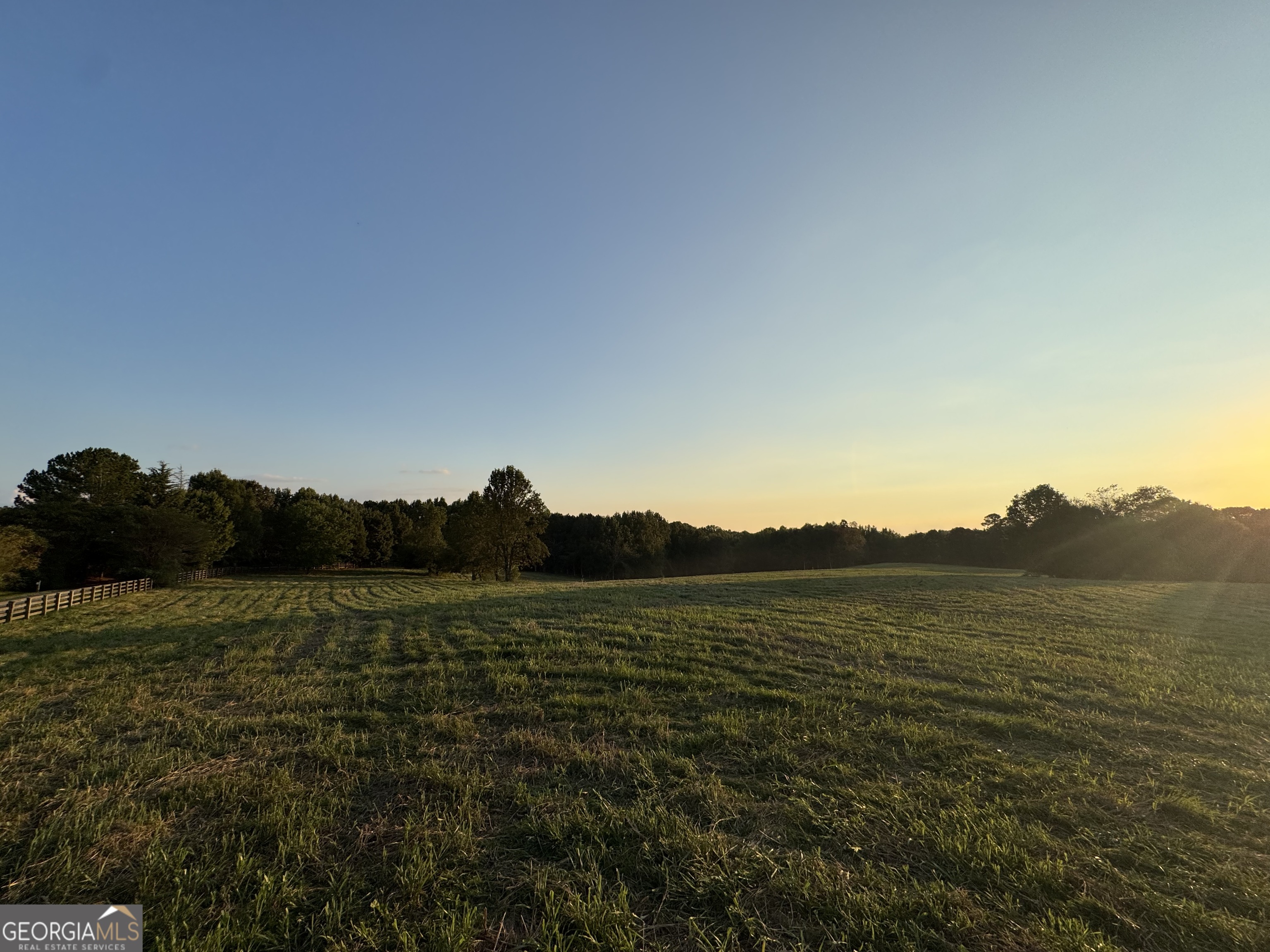 1045 Pleasant Hill Road Jasper, GA 30143 - Photo 7 of 20 a view of an ocean beach and mountain