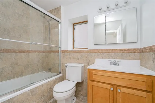 $879,000 | 8403 19th Avenue, Unit 2A | Van Pelt Manor