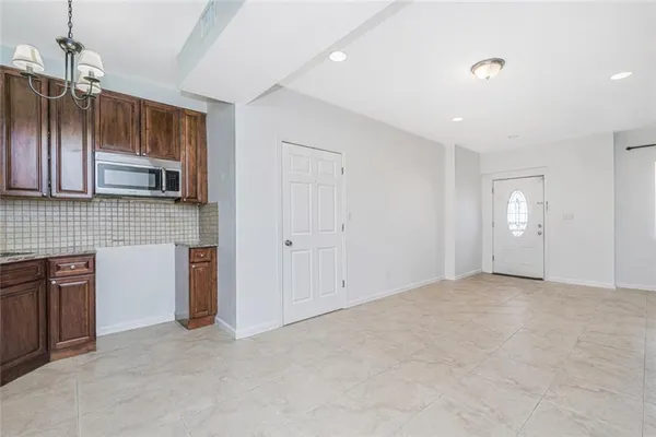 $879,000 | 8403 19th Avenue, Unit 2A | Van Pelt Manor