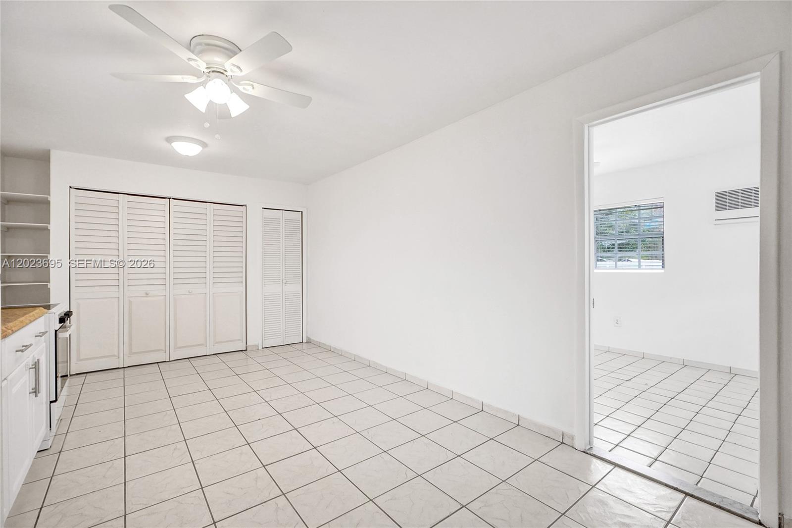 877 West 33rd Street, Unit A Hialeah, FL 33012 - Photo 13 of 36 Kitchen/Family/Dining Area