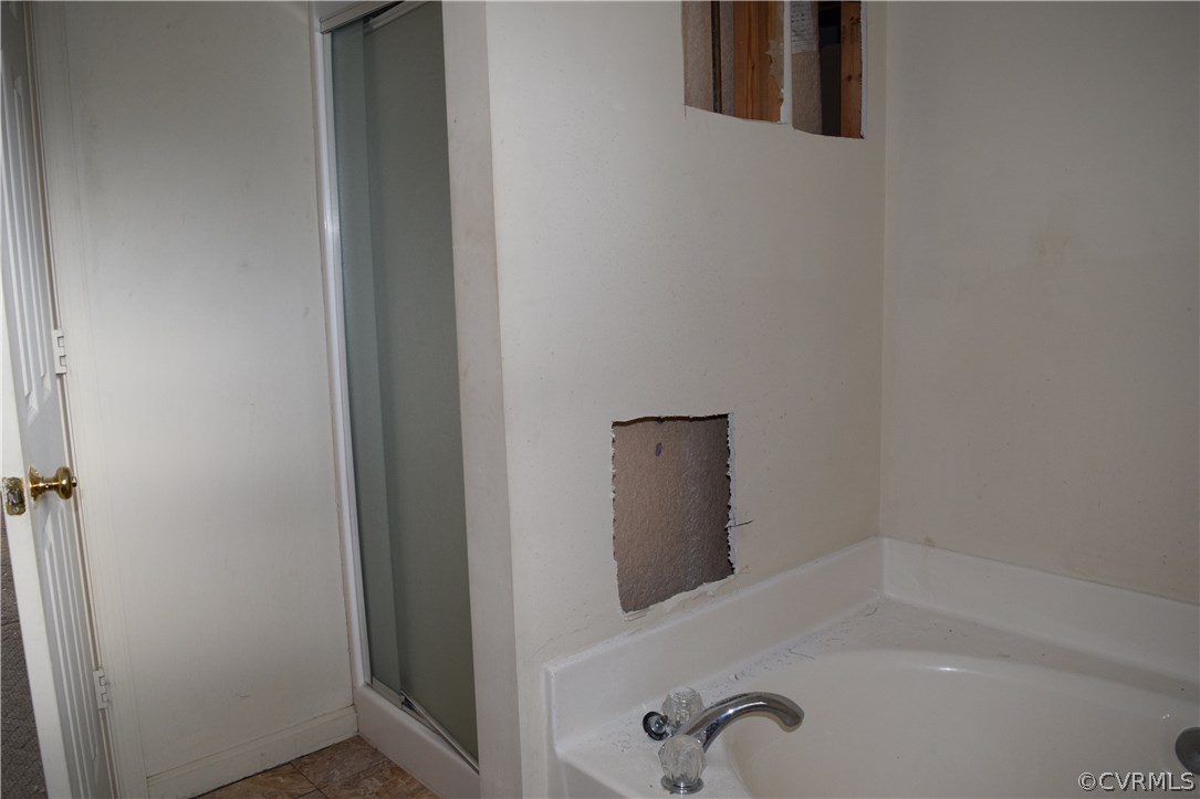 16718 Amherst Ridge Court Colonial Heights, VA 23834 - Photo 21 of 35 Soaking Tub and Standing Shower