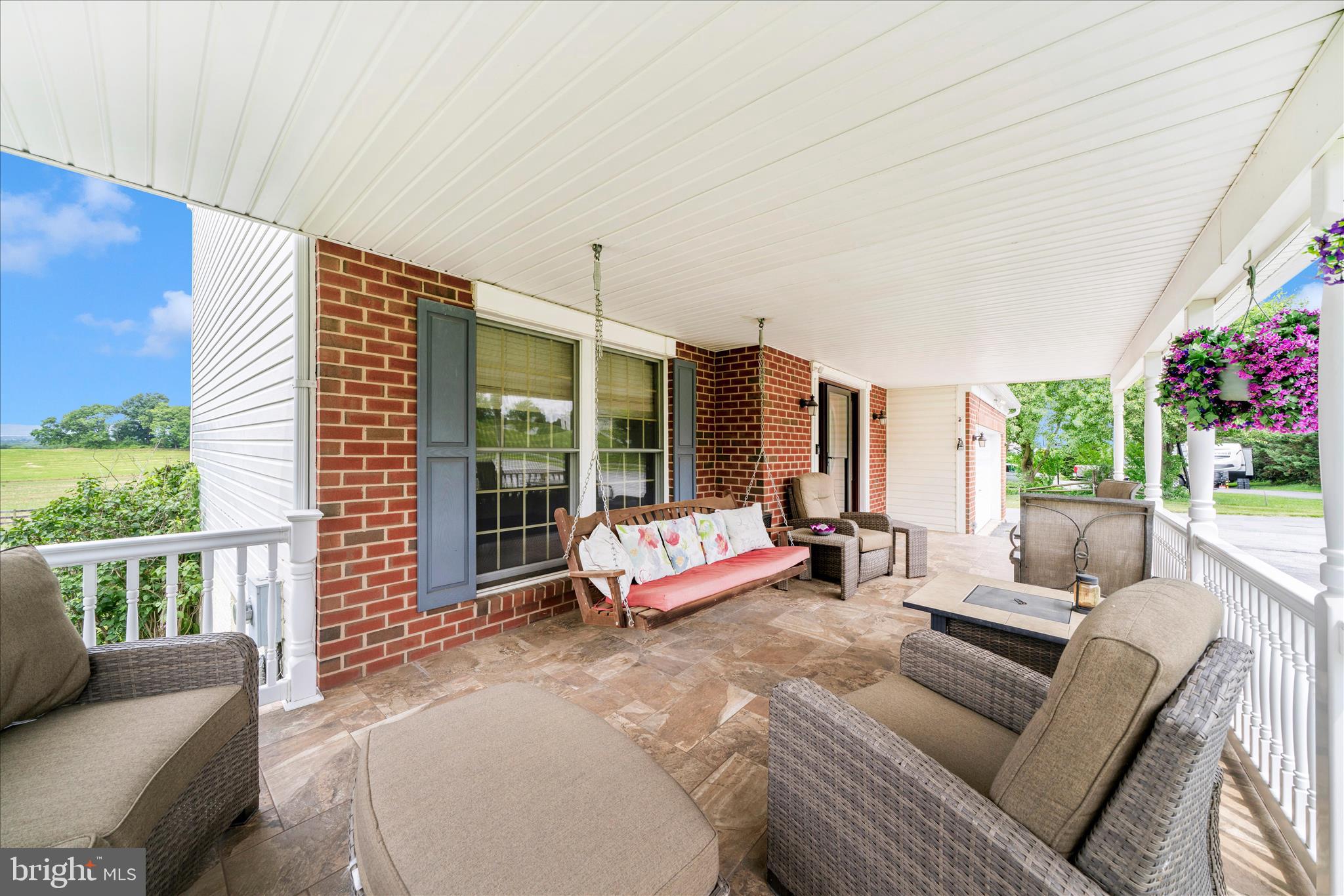 9534 Liberty Road Frederick, MD 21701 - Photo 8 of 70 a outdoor living space with furniture and garden view
