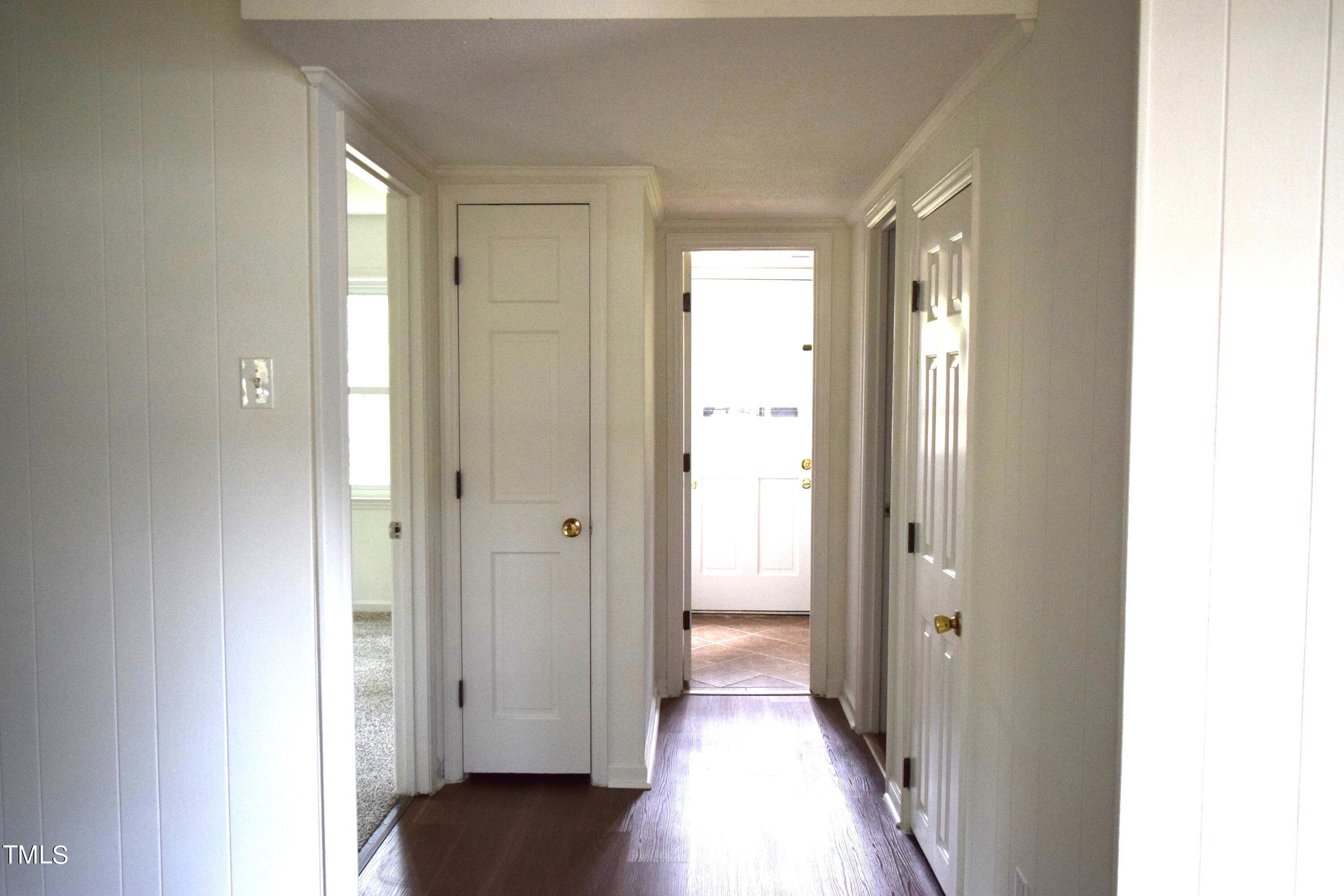 2731 Umstead Road Durham, NC 27712 - Photo 14 of 22 a view of a hallway with wooden floor